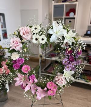 Elegant Pink & White Heart-Shaped Sympathy Wreath. Fresh flower bouquets in Toronto